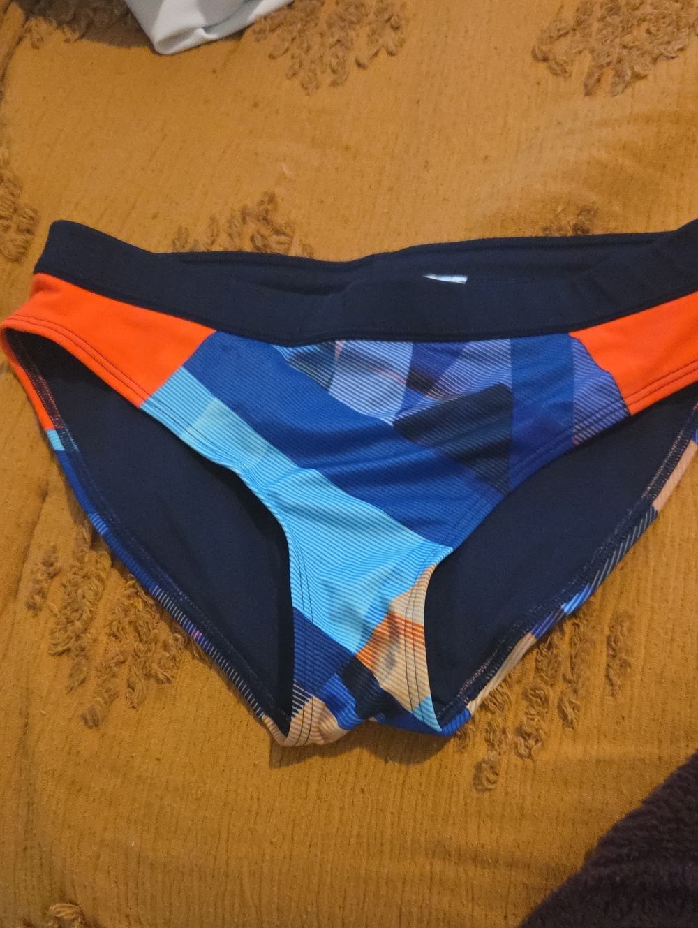 Athleta Navy Swim Bottom with Bright Orange Accents